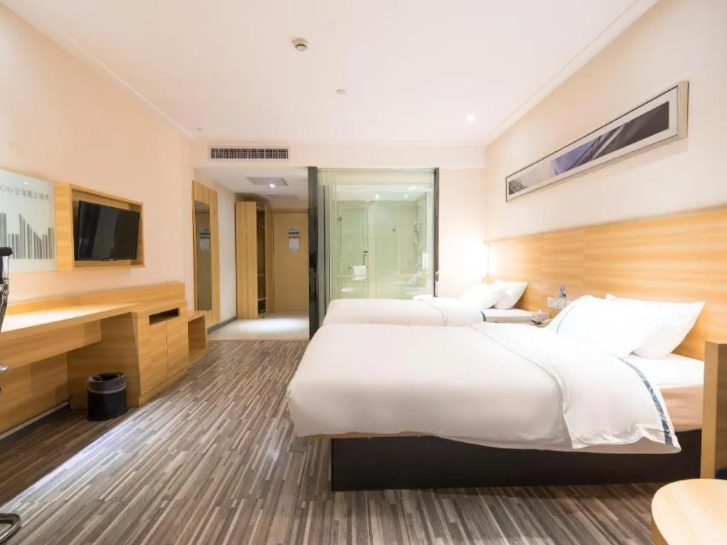 Bed in City Comfort Inn Wuhan High Speed Railway Station