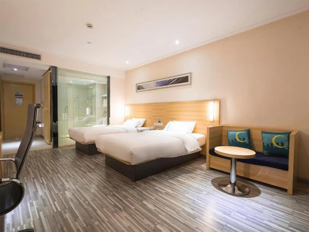 Bed in City Comfort Inn Wuhan High Speed Railway Station