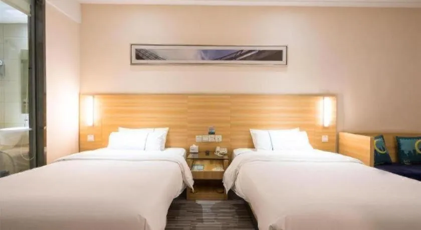 Bed in City Comfort Inn Wuhan High Speed Railway Station