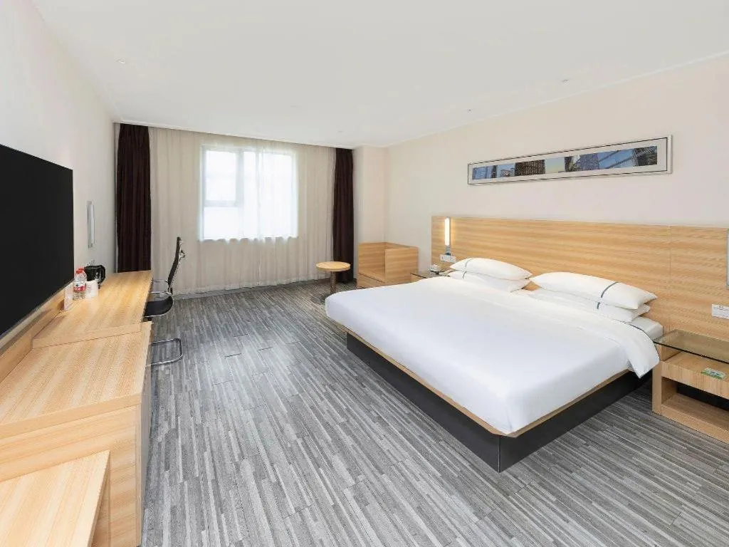 Bed in City Comfort Inn Wuhan High Speed Railway Station