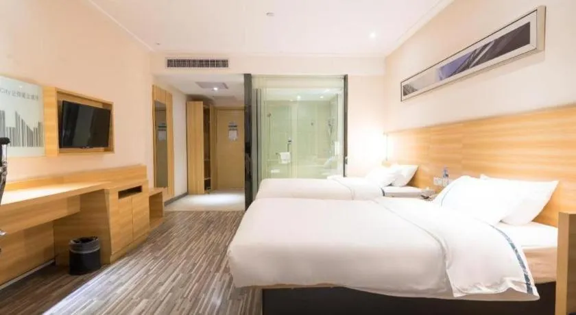 Bed in City Comfort Inn Wuhan High Speed Railway Station