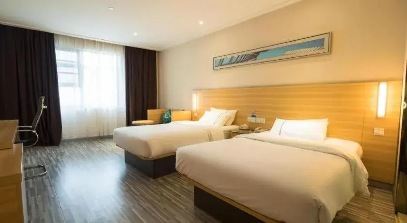 Bed in City Comfort Inn Wuhan High Speed Railway Station Bed in City Comfort Inn Wuhan High Speed Railway Station