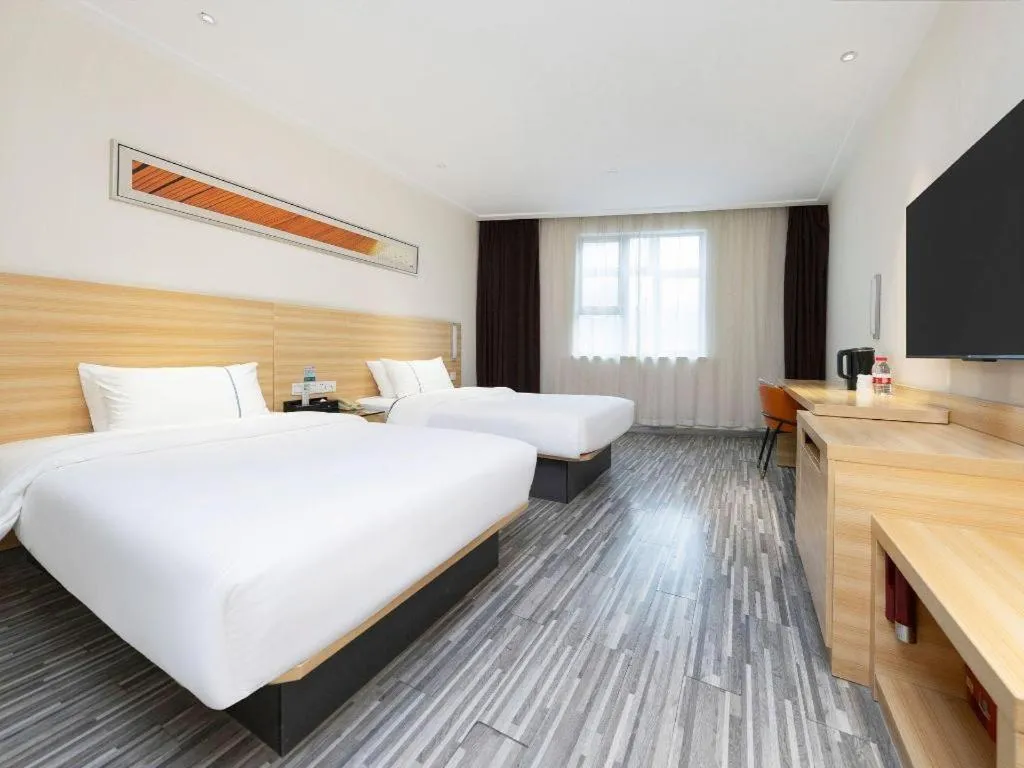 Bed in City Comfort Inn Wuhan High Speed Railway Station