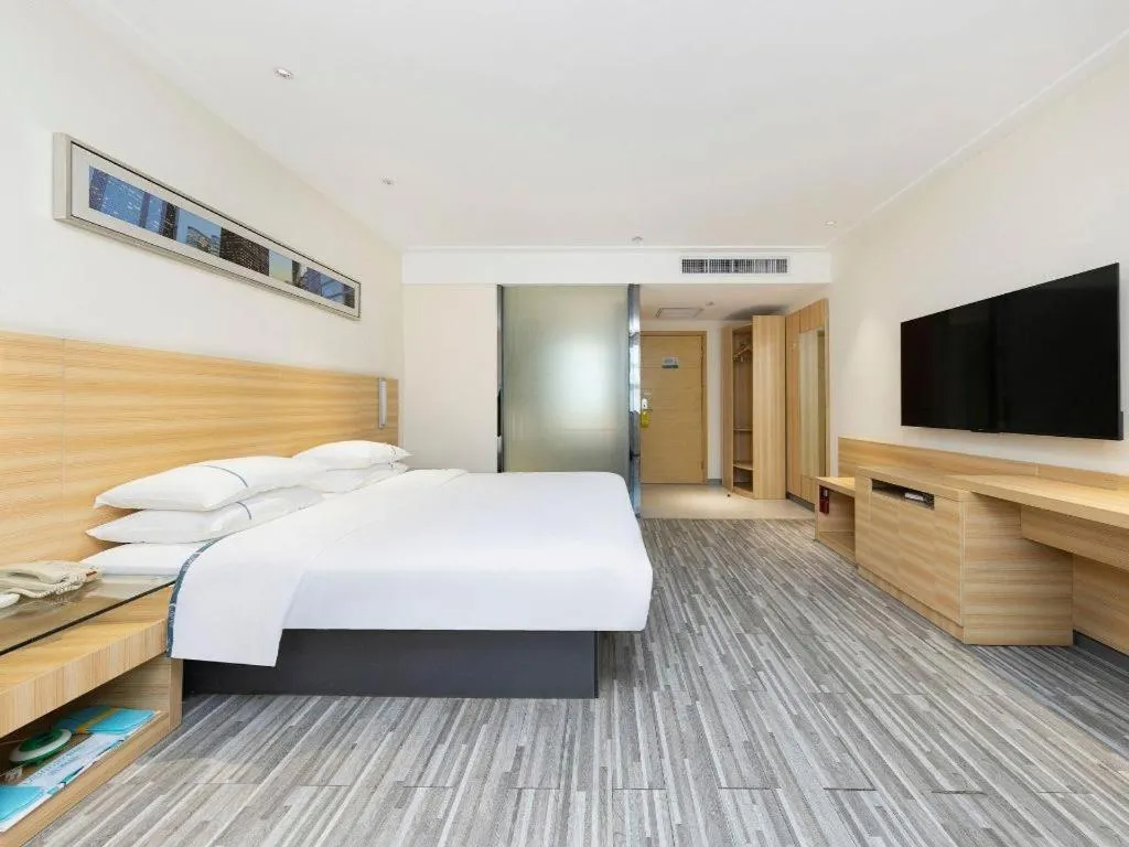 Bed in City Comfort Inn Wuhan High Speed Railway Station