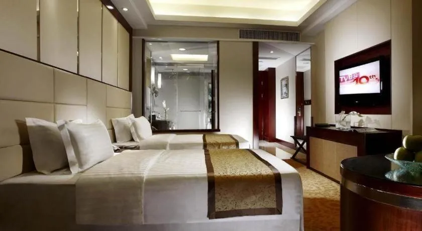 Bed in Dezhou Regal Kangbo Hotel