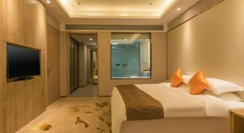 Bed in Dezhou Regal Kangbo Hotel