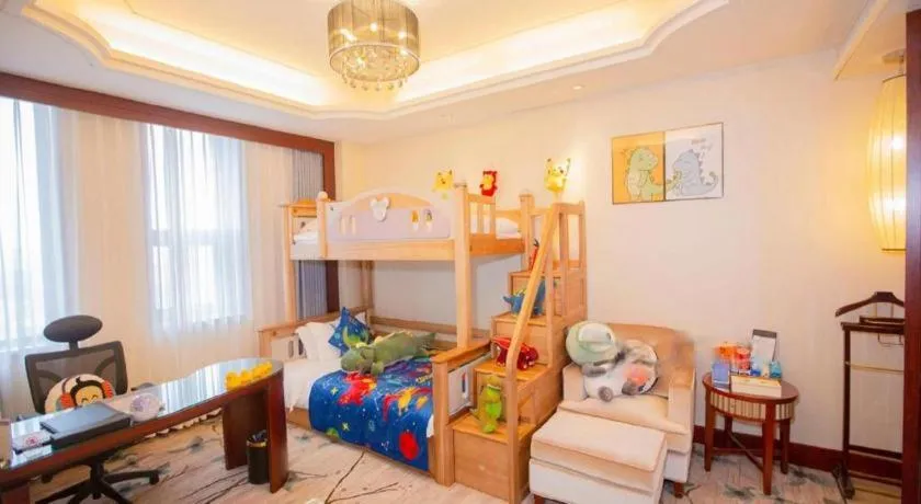 Bed in Dezhou Regal Kangbo Hotel