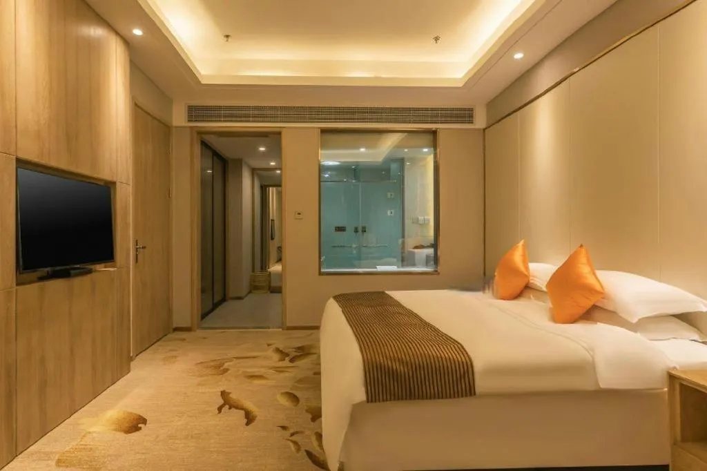 Bed in Dezhou Regal Kangbo Hotel