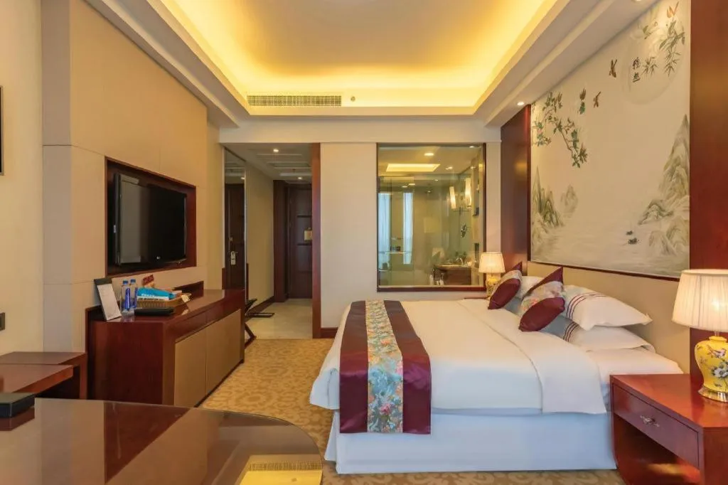 Bed in Dezhou Regal Kangbo Hotel