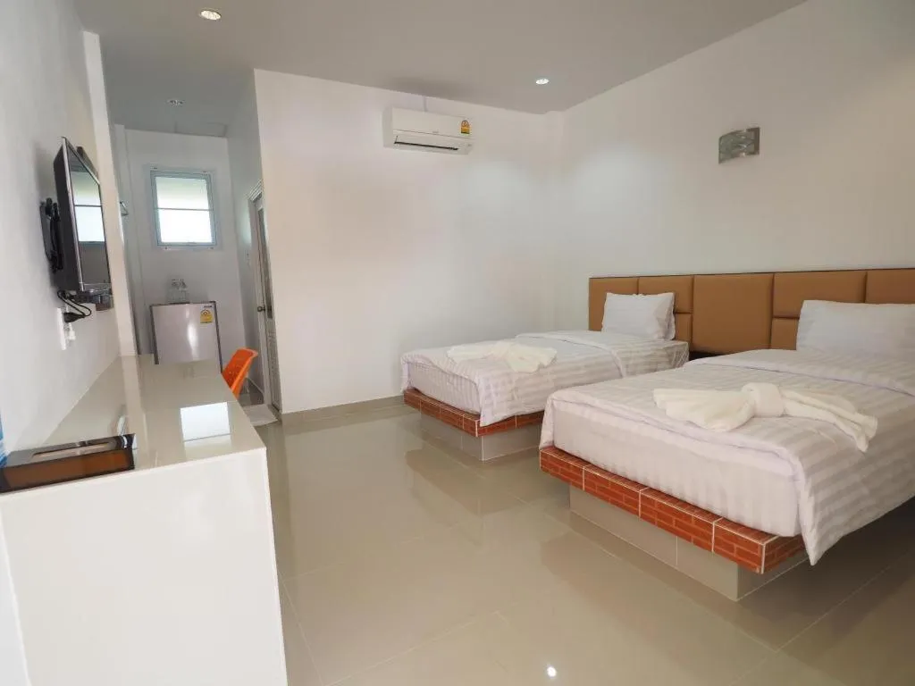 Bed in The Phant Hotel