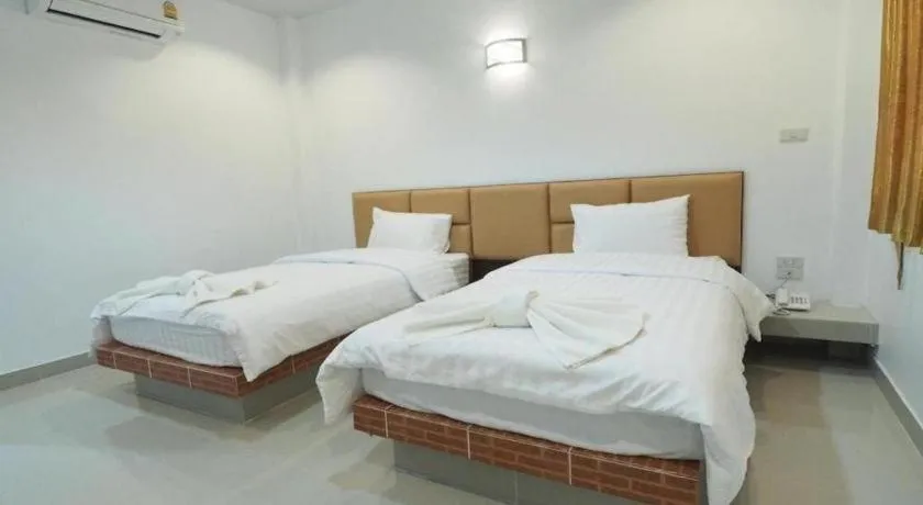 Bed in The Phant Hotel