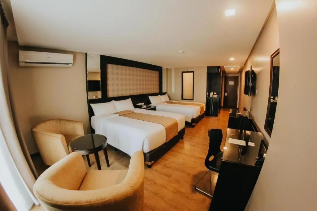 Bed in Grand Xing Imperial Hotel