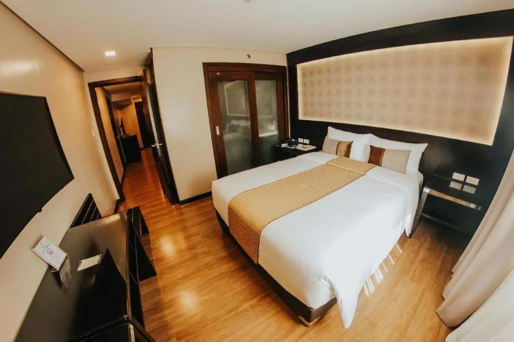 Bed in Grand Xing Imperial Hotel