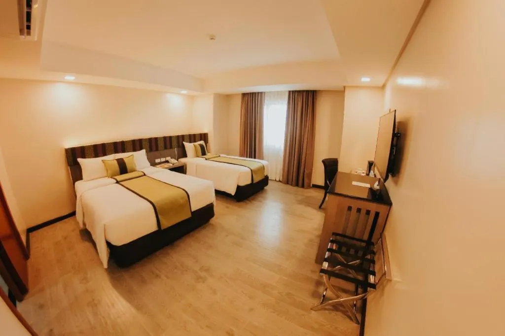 Bed in Grand Xing Imperial Hotel