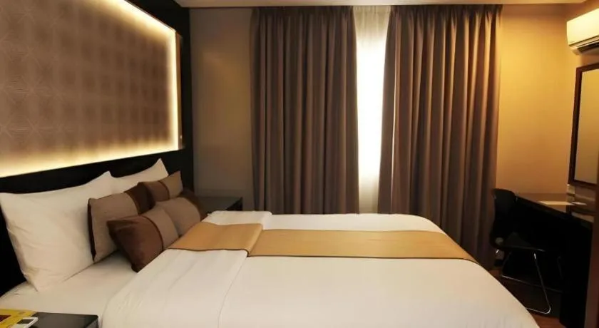 Bed in Grand Xing Imperial Hotel