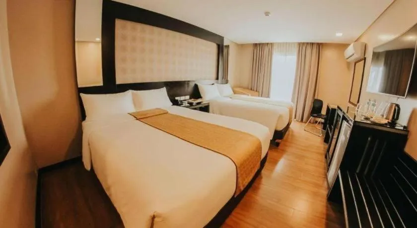 Bed in Grand Xing Imperial Hotel