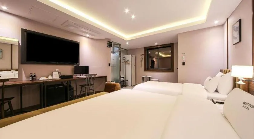 Bed in Button Hotel