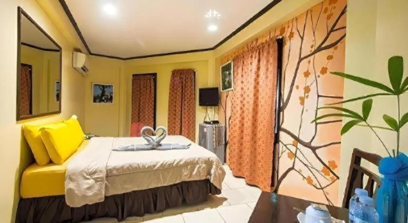 Bed in Alta Cebu Resort