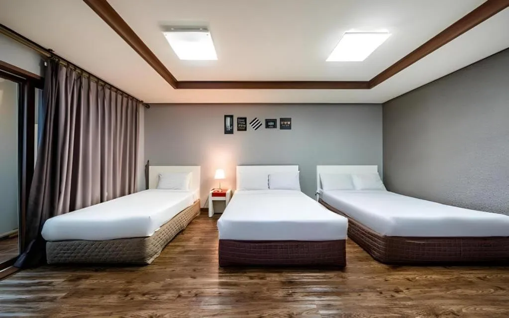 Bed in Woorim Hotel