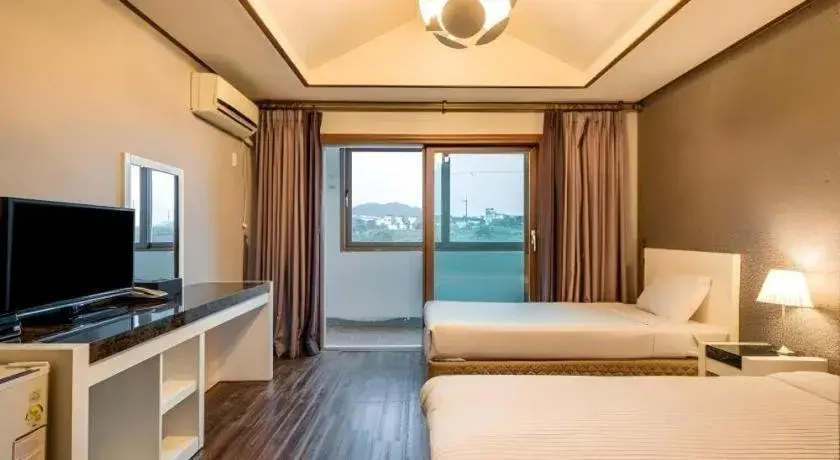 Bed in Woorim Hotel Bed in Woorim Hotel