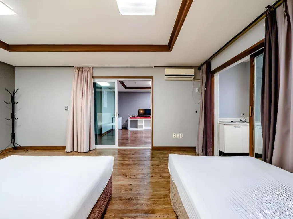 Bed in Woorim Hotel