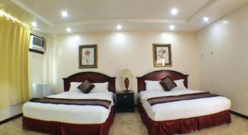 Bed in Cindy Kelly Hotel