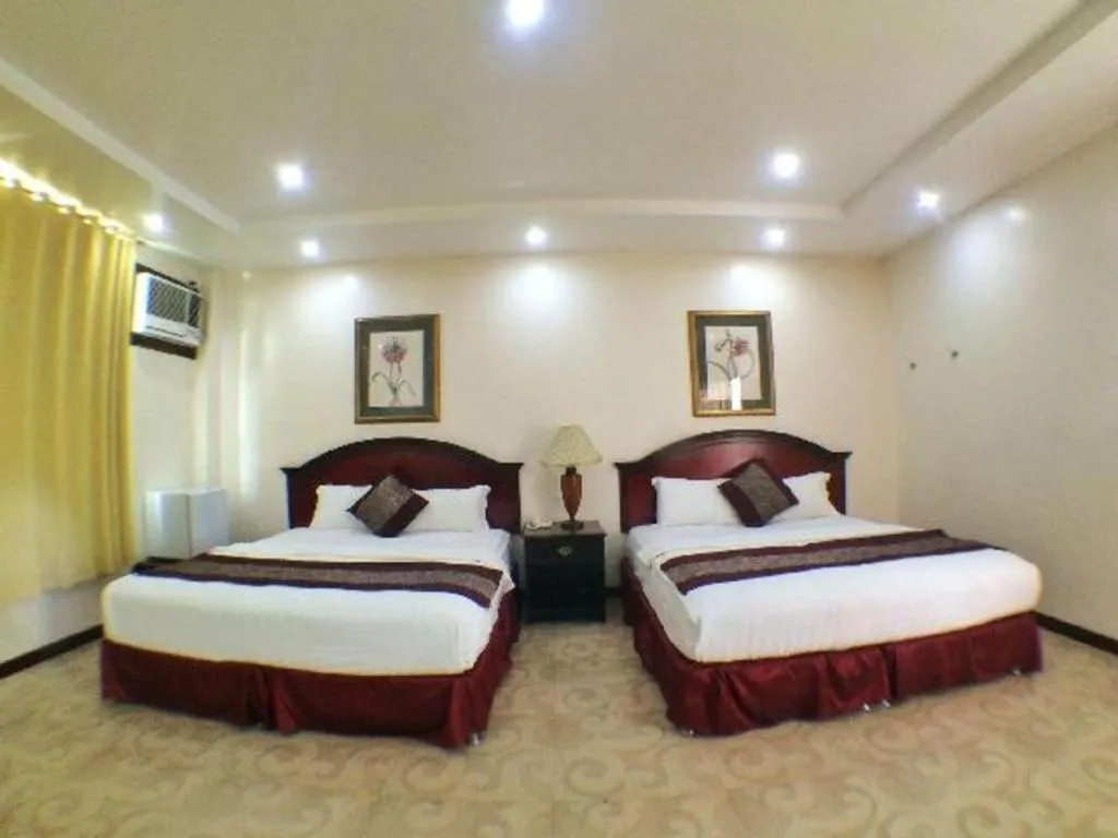 Bed in Cindy Kelly Hotel