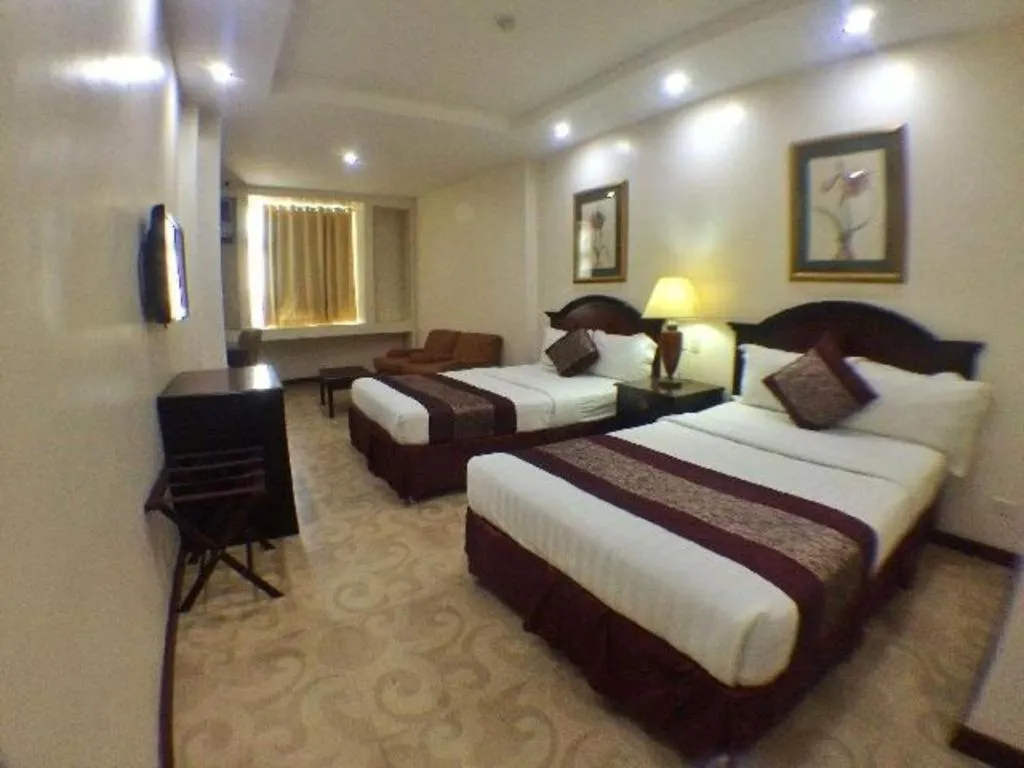 Bed in Cindy Kelly Hotel