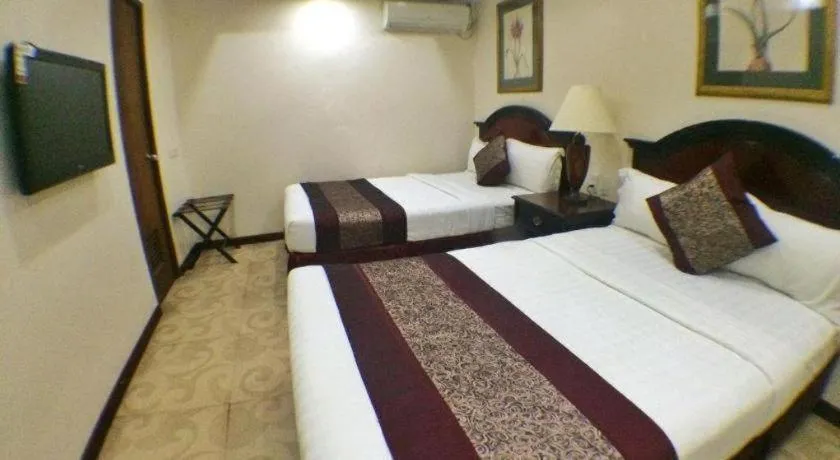 Bed in Cindy Kelly Hotel