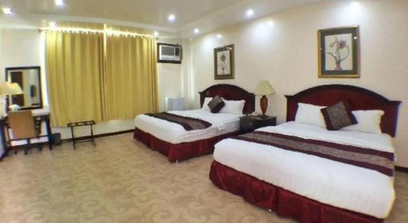 Bed in Cindy Kelly Hotel