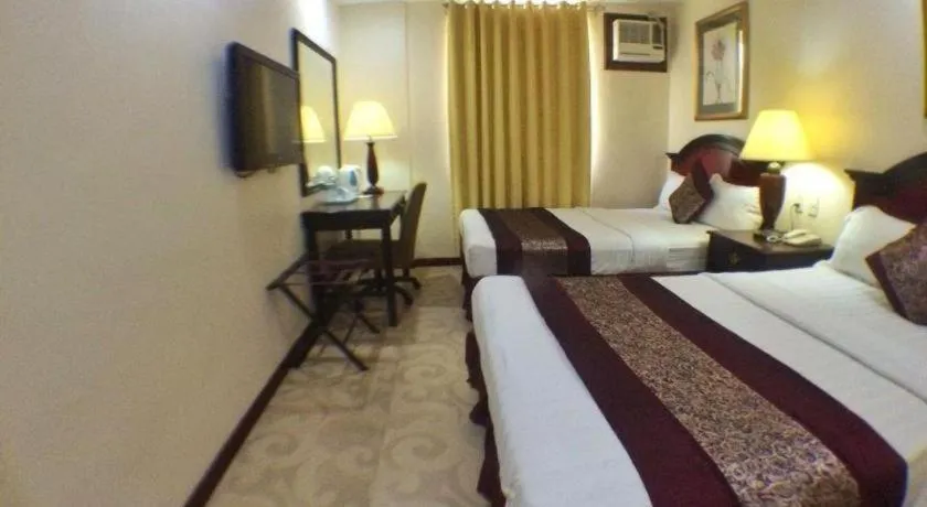 Bed in Cindy Kelly Hotel