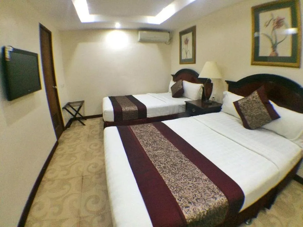 Bed in Cindy Kelly Hotel