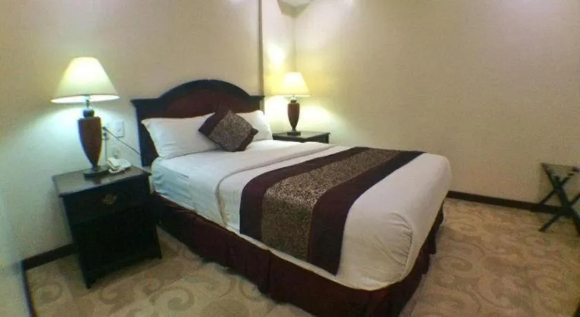 Bed in Cindy Kelly Hotel