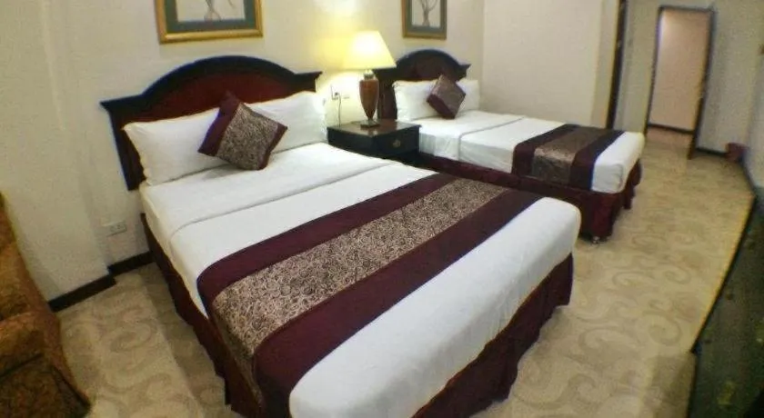 Bed in Cindy Kelly Hotel