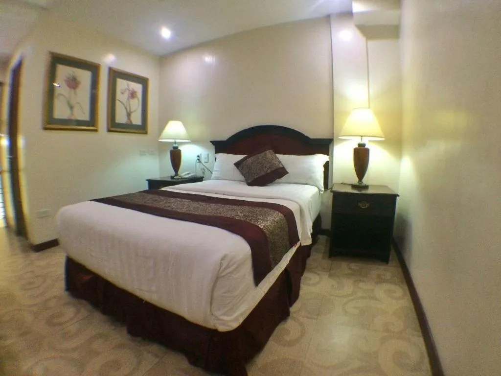 Bed in Cindy Kelly Hotel