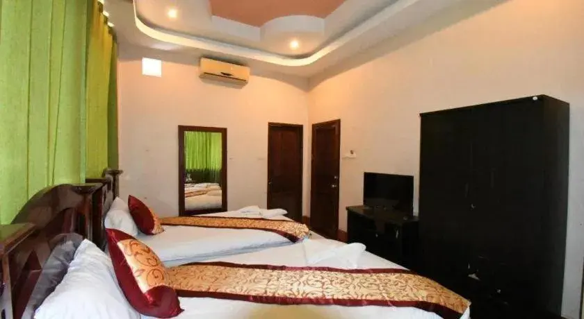 Bed in PXT Hotel Bed in PXT Hotel