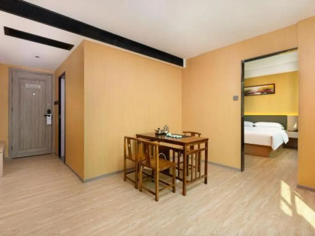 Bed in Borrman Hotel Guangzhou Tianhe Tangdong Subway Station Convention and Exhibition Center