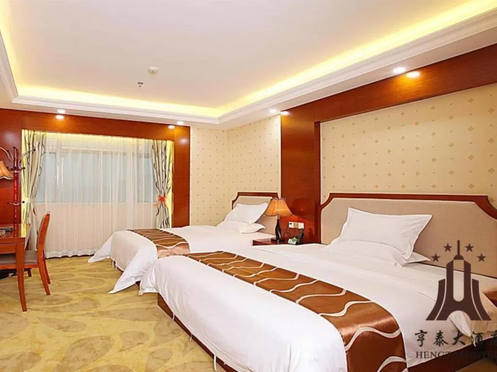 Bed in Borrman Hotel Guangzhou Tianhe Tangdong Subway Station Convention and Exhibition Center