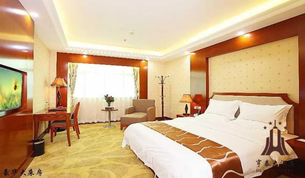 Bed in Borrman Hotel Guangzhou Tianhe Tangdong Subway Station Convention and Exhibition Center