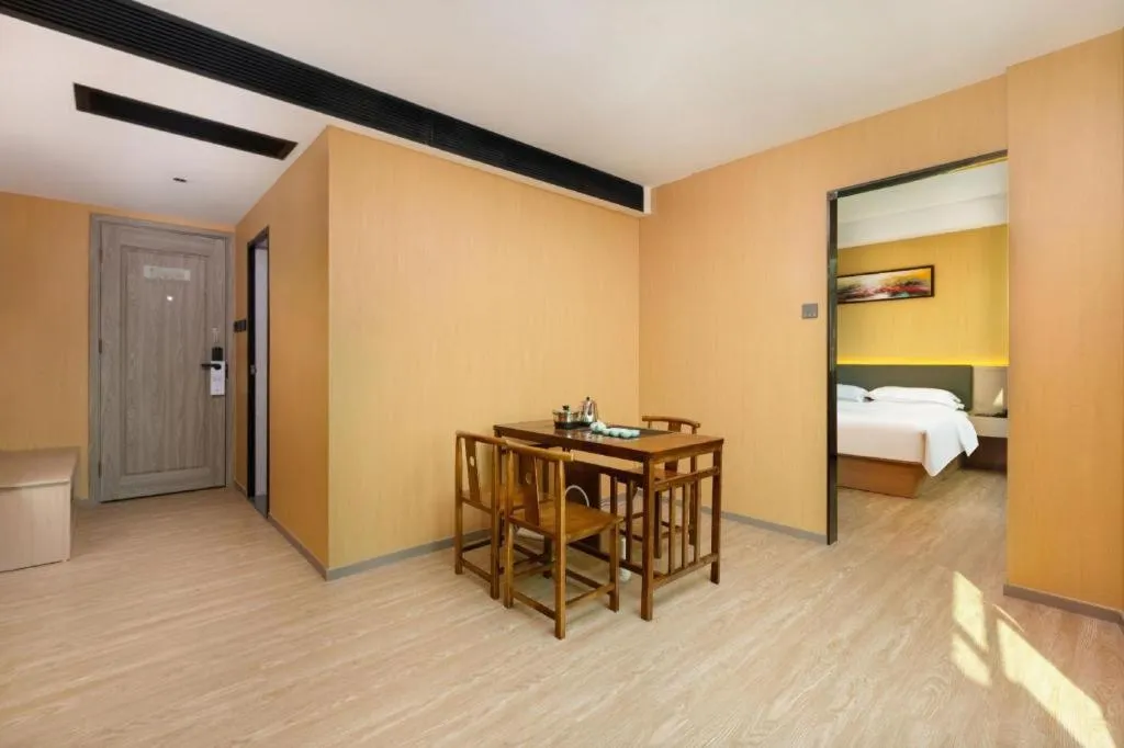 Bed in Borrman Hotel Guangzhou Tianhe Tangdong Subway Station Convention and Exhibition Center