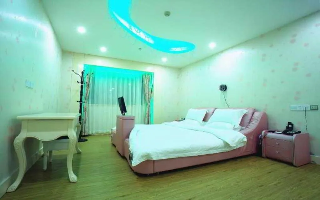 Bed in Borrman Hotel Guangzhou Tianhe Tangdong Subway Station Convention and Exhibition Center
