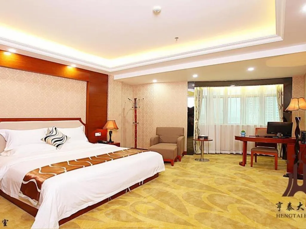 Bed in Borrman Hotel Guangzhou Tianhe Tangdong Subway Station Convention and Exhibition Center