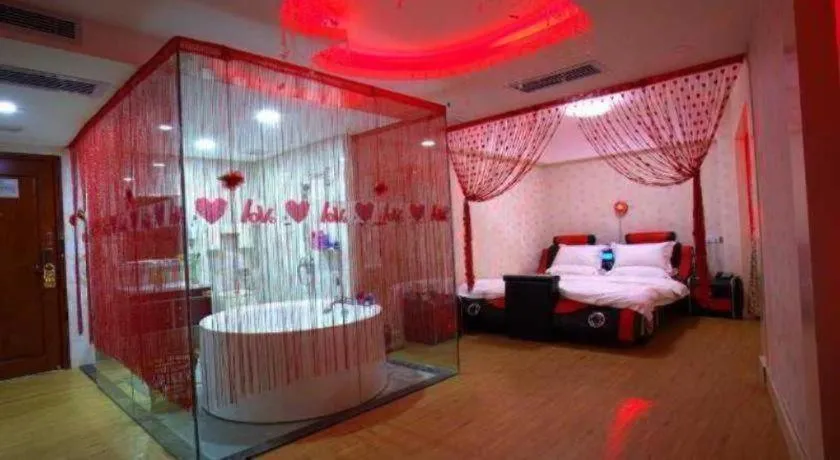 Bed in Borrman Hotel Guangzhou Tianhe Tangdong Subway Station Convention and Exhibition Center