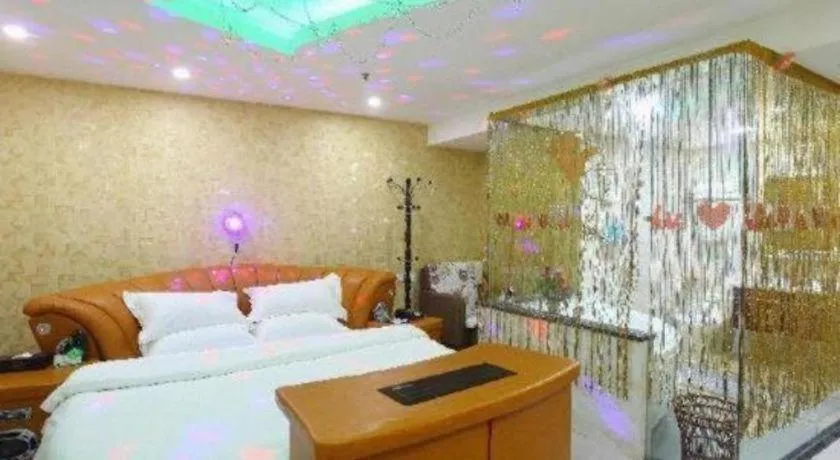 Bed in Borrman Hotel Guangzhou Tianhe Tangdong Subway Station Convention and Exhibition Center