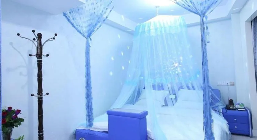 Bed in Borrman Hotel Guangzhou Tianhe Tangdong Subway Station Convention and Exhibition Center