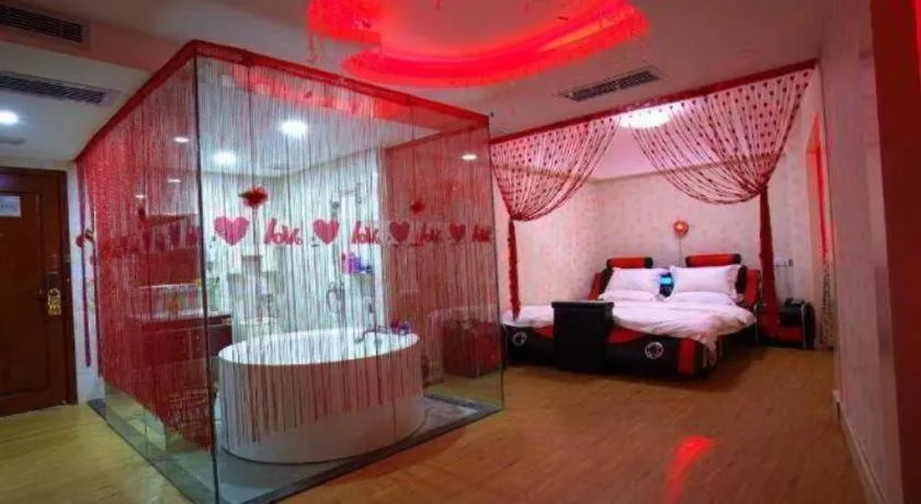 Bed in Borrman Hotel Guangzhou Tianhe Tangdong Subway Station Convention and Exhibition Center