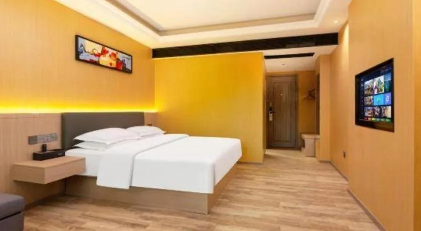 Bed in Borrman Hotel Guangzhou Tianhe Tangdong Subway Station Convention and Exhibition Center