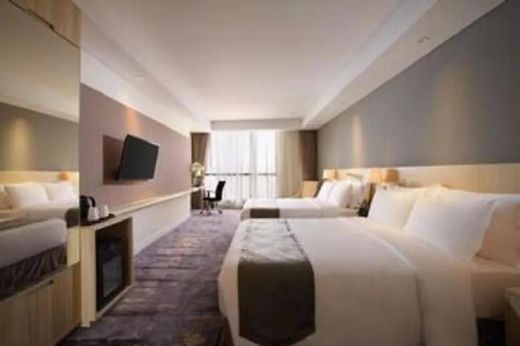 Bed in Hotel Grandhika Pemuda