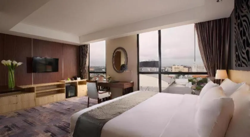 Bed in Hotel Grandhika Pemuda