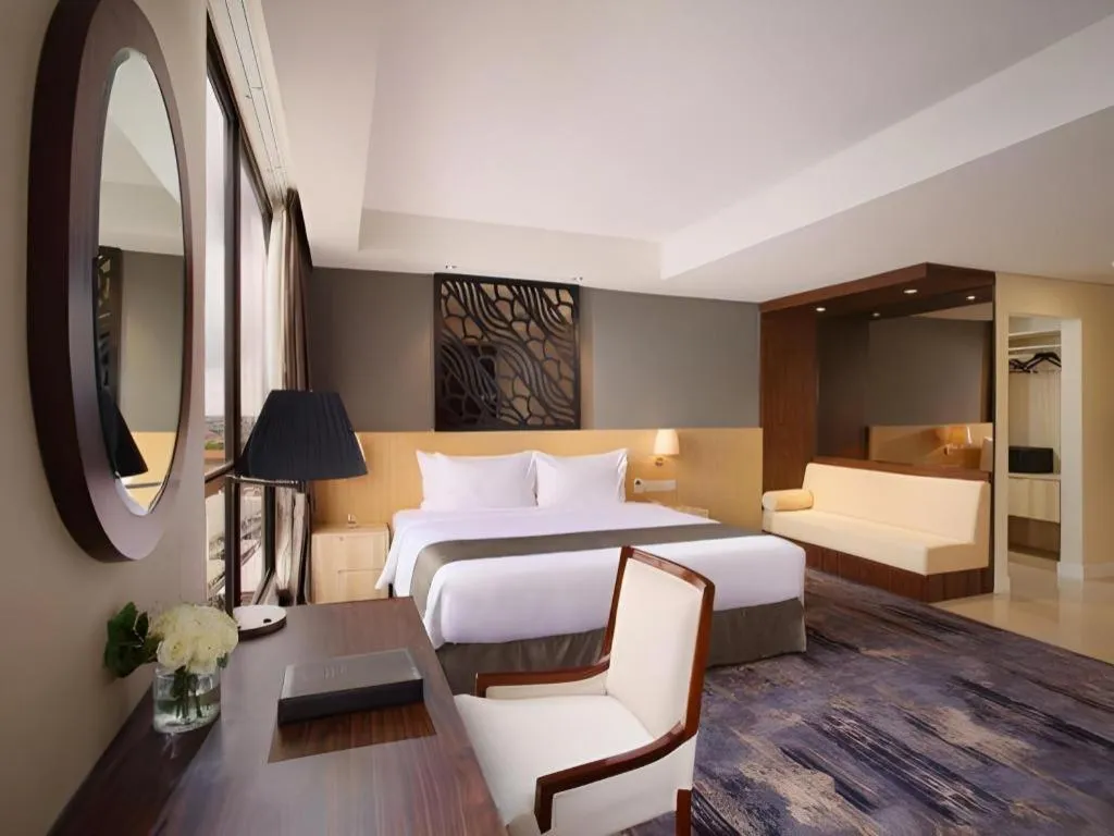 Bed in Hotel Grandhika Pemuda